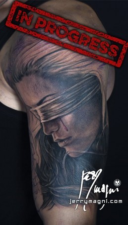 First sitting Black and grey full sleeve tattoo. On the shoulder a beautiful portrait of a blindfolded girl, a red tear on her face, inside the arm a skull with a clock nestled in the cranium. On the forearm mister Heisenberg, from the tv series Breaking Bad, is working with tubes full of red liquid. Inside the forearm a mister hide with bloodshot eyes is roaming in ancient London alleys. Immaculately done by the best artist Jerry Magni, Italy, Milan, Bergamo, Lugano.