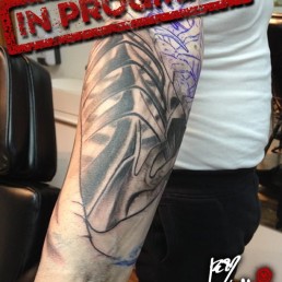 First sitting Full color biomech tattoo sleeve. Light blue metal parts as a shield for a sort of spine running inside the arm and a sort of bone structure over the forearm. Masterfully done by by the best tattoo artist Jerry Magni, Bergamo, Milan, Lugano, Italy.