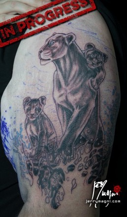 Realistic lioness tattoo, cubs, sea, storm. firstJerry Magni tattoo artist. Italy