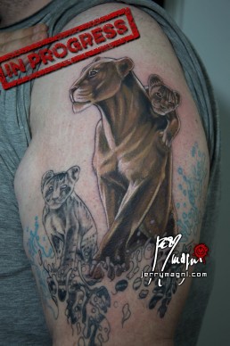 Second sitting realistic lioness tattoo, cubs, sea, storm. Jerry Magni tattoo artist. Italy