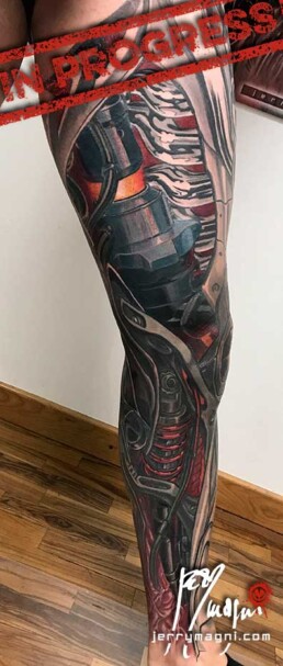 11th sitting of a coloured biomech tattoo leg sleeve