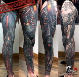 13th sitting of a coloured biomech tattoo leg sleeve