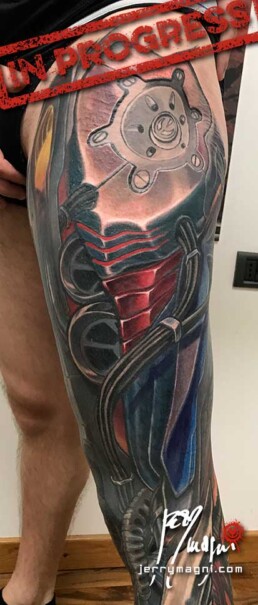 14th sitting of a coloured biomech tattoo leg sleeve