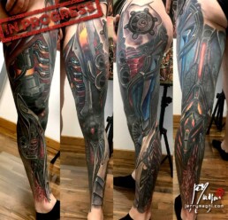 15th sitting of a coloured biomech tattoo leg sleeve