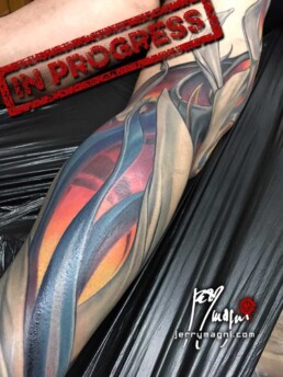 seventh session Full color biomech leg sleeve tattoo. Blue metallic surfaces with warm lights inside. Masterfully done by Jerry Magni Tattoo artist, one of the best Italian tattoo artist; Milano, Bergamo, Lugano, Italy Lombardy.