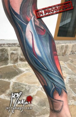 eight session Full color biomech leg sleeve tattoo. Blue metallic surfaces with warm lights inside. Masterfully done by Jerry Magni Tattoo artist, one of the best Italian tattoo artist; Milano, Bergamo, Lugano, Italy Lombardy.