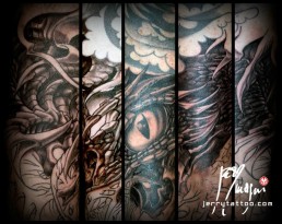 second sitting Biomech bio organic full sleeve and part of the neck tattoo. Abstract shapes with scales and stings in which there are a human blue eye and a snake eye. The background is done with orange, purple and red color. Done by by the best tattoo artist Jerry Magni, Bergamo, Milan, Lugano, Italy.