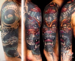 terza seduta Copertura di un orribile tatuaggio con uno nuovo, drago rosso con bocca aperta e corna. Jerry Magni Tattoo Artist. Miglior tatuatore Milano, Bergamo, Brescia, Lugano