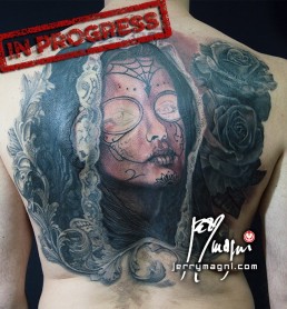 Fifth sitting Black and grey Back piece tattoo. Portrait of a beautiful girl with the typical make up from the Mexican day of the dead, on her head a black lace veil, behind her a couple of roses, everything surrounded by filigree. Outstanding piece of art, masterfully done by by the best tattoo artist Jerry Magni, Bergamo, Milan, Lugano, Italy.