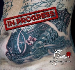 Twentyeighth sitting Biomech and oriental tattoo jacket, metal parts, cherry flowers and waves all over the sleeves, back and torso. Jerry Magni Tattoo Artist Bergamo, Milan, Italy