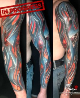 Fifth sitting of a colour biomech tattoo sleeve