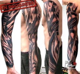 third sitting of a colour biomech tattoo sleeve