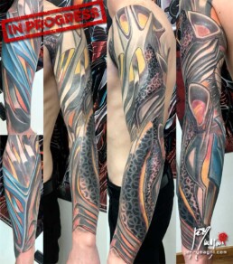 fifth sitting of a colour biomech tattoo sleeve