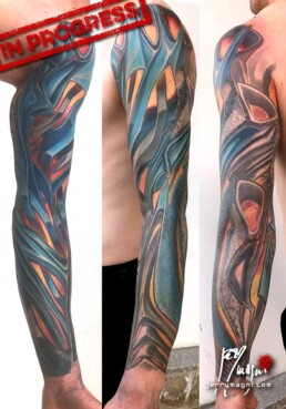 sixth sitting of a colour biomech tattoo sleeve