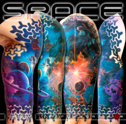 half sleeve color tattoo with planetary landscape and framed with a graphic pattern. Masterfully done by Jerry Magni, one of the best Italian tattoo artist.