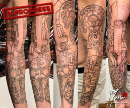 Seconda seduta tatuaggio a colori biomeccanico steampunk a tutta manica