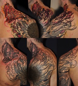 fifth sitting Biomech bio organic full sleeve and part of the neck tattoo. Abstract shapes with scales and stings in which there are a human blue eye and a snake eye. The background is done with orange, purple and red color. Done by by the best tattoo artist Jerry Magni, Bergamo, Milan, Lugano, Italy.