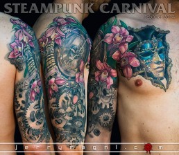 Half sleeve color tattoo, steampunk theme, gears, orchids, clock, venetian mask, black and grey. Jerry Magni Tattoo artist, Bergamo, Italy, Milano, Best tattoo Artist; Lombardy, Monza, original unique works